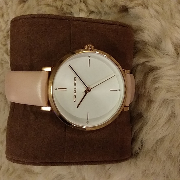 Michael Kors Accessories - NWOT Michael kors light pink leather watch band trimmed in gold.